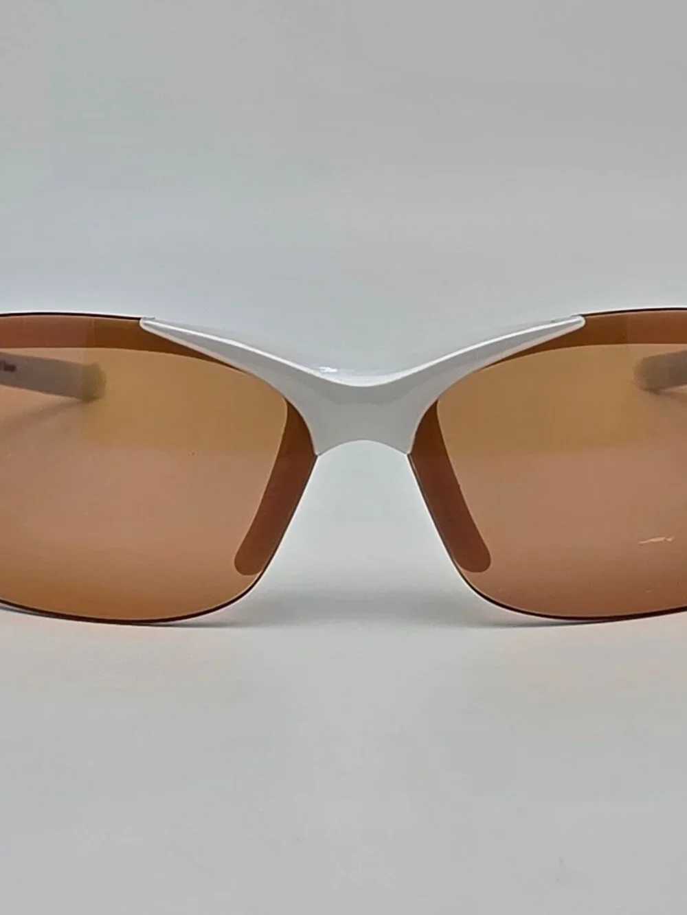 Tifosi Wisp Pearl White Baby Blue Frame Purple Mirror Lens Rimless Sunglasses